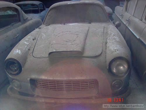 cars in the barn