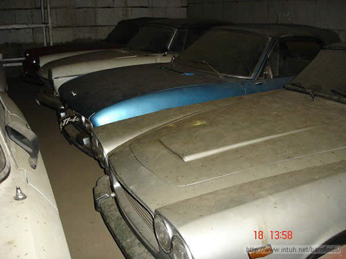 cars in the barn