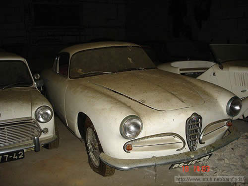 cars in the barn